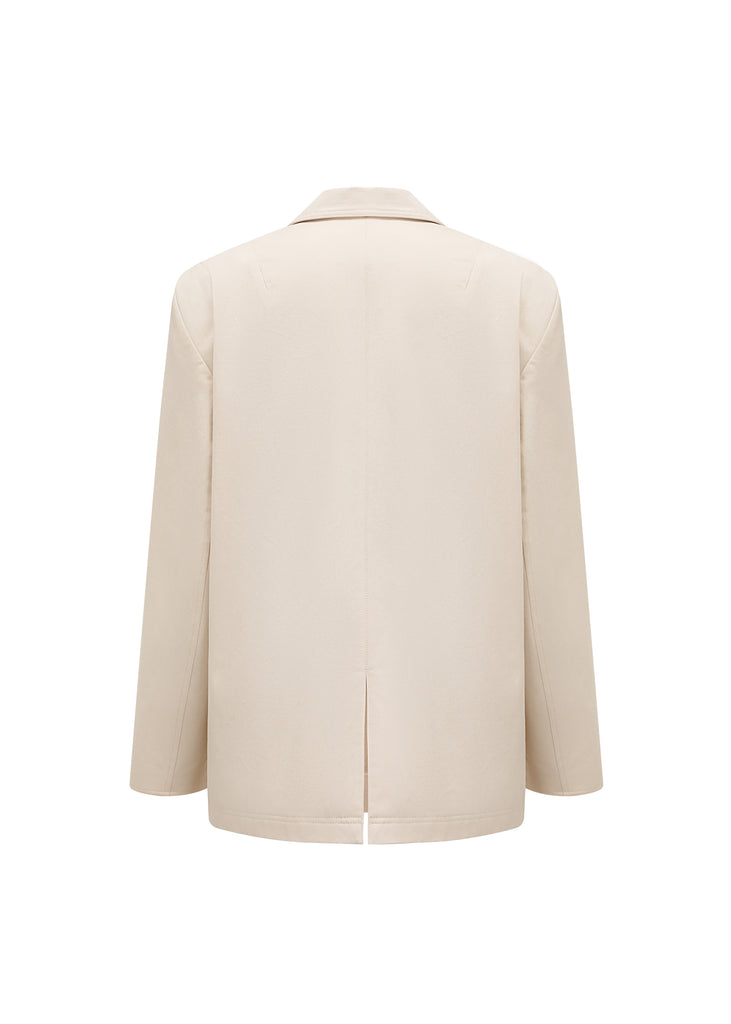 Bellow Jacket in Cream *Relaxed fit *Peak lapels *Padded shoulder *Slanted bellow pockets *Fully lined *Singapore fashion brand